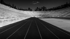 A black and white photo of an empty stadium.