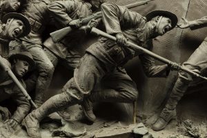 A statue of a group of soldiers fighting.